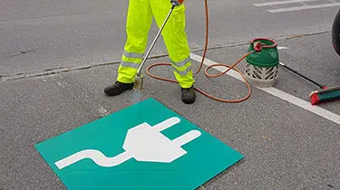 Montering af PREMARK symbol på asfalt